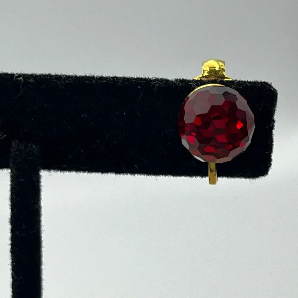 Vintage red glass multi faceted gold tone clip on earrings